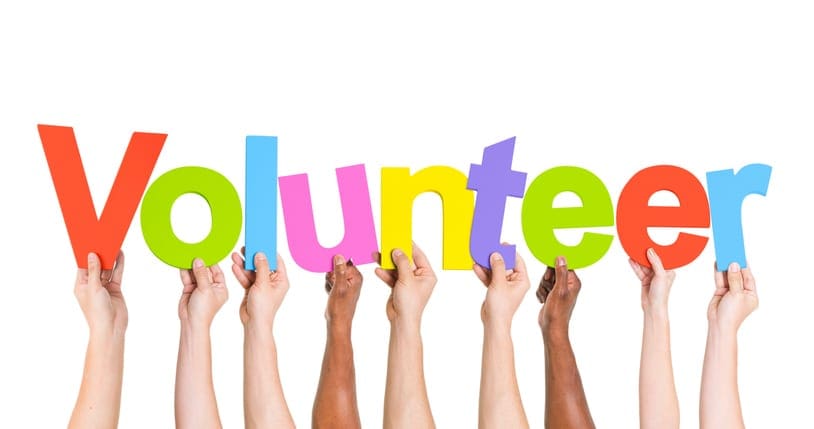 Diverse Hands Holding The Word Volunteer Diverse Hands Holding The Word Volunteer